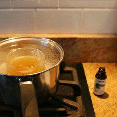 Pine-Scented Beeswax Candle | thecrunchyurbanite.com — Make your own all-natural beeswax candles with essential oils!